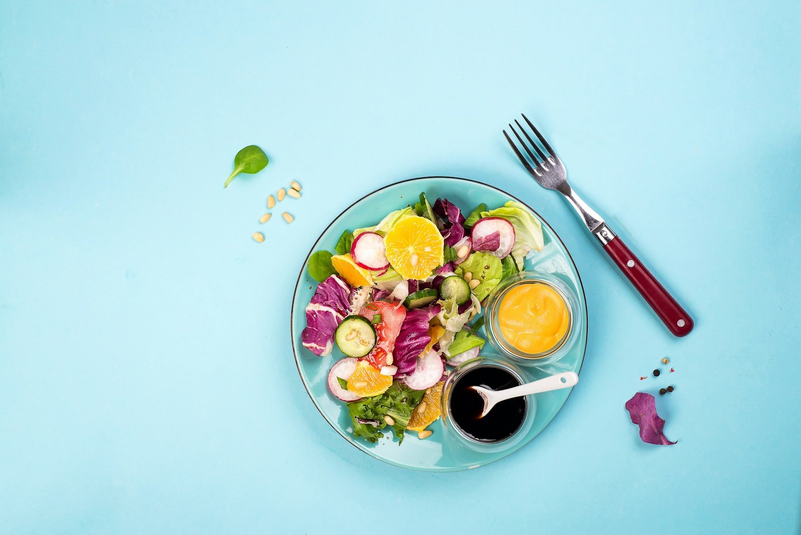 Diet vegetables salad. Fresh mixed falling into a plate