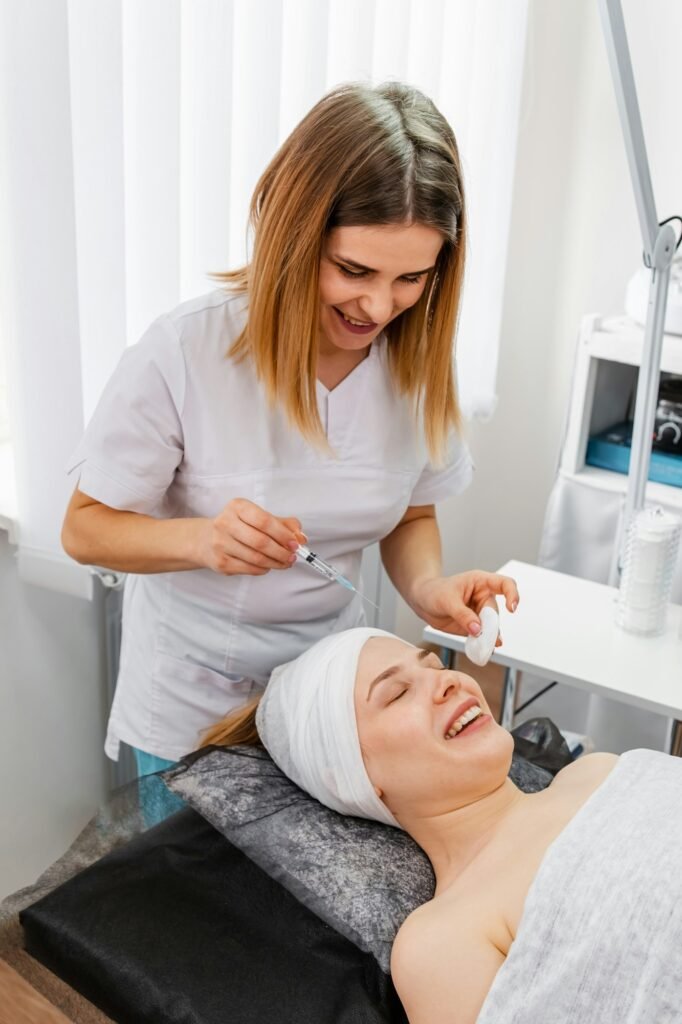 Woman recieving anti-aging injections. Cosmetic injection of botox